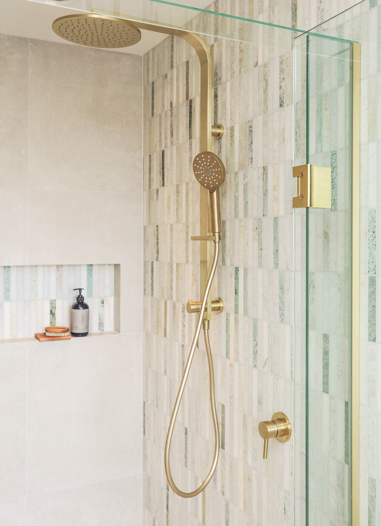 shower-tapware-brushed-brass-in-tiled-bathroom