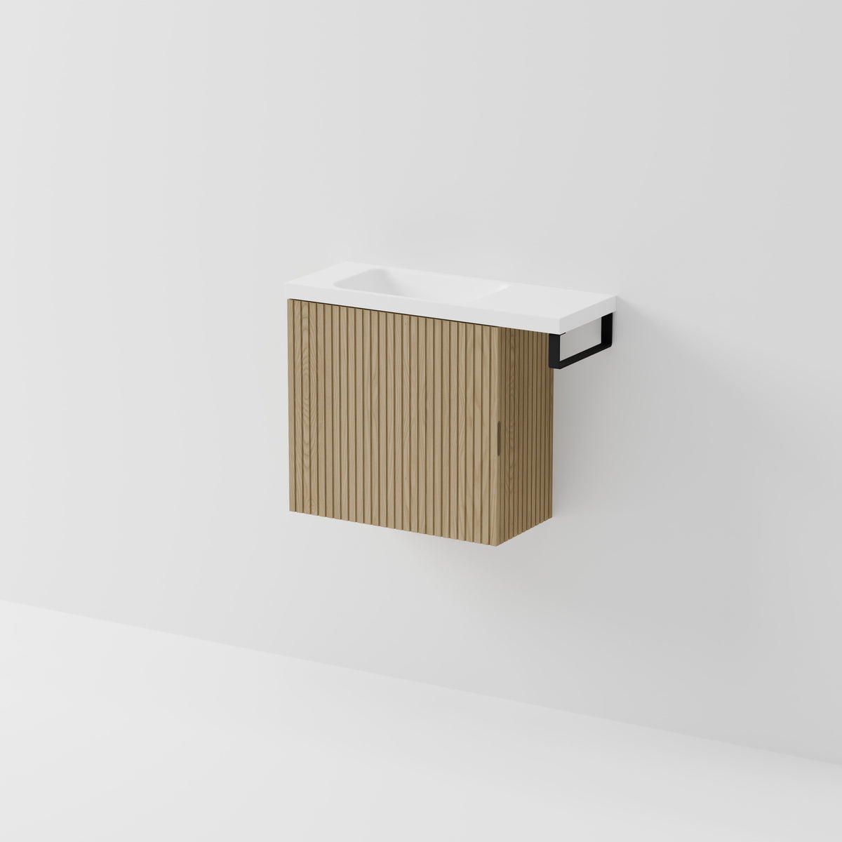 Aria 550 wall-hung WC vanity in Light Ash timber with an offset basin and integrated Matte Black hand towel rail, shown against a white background.