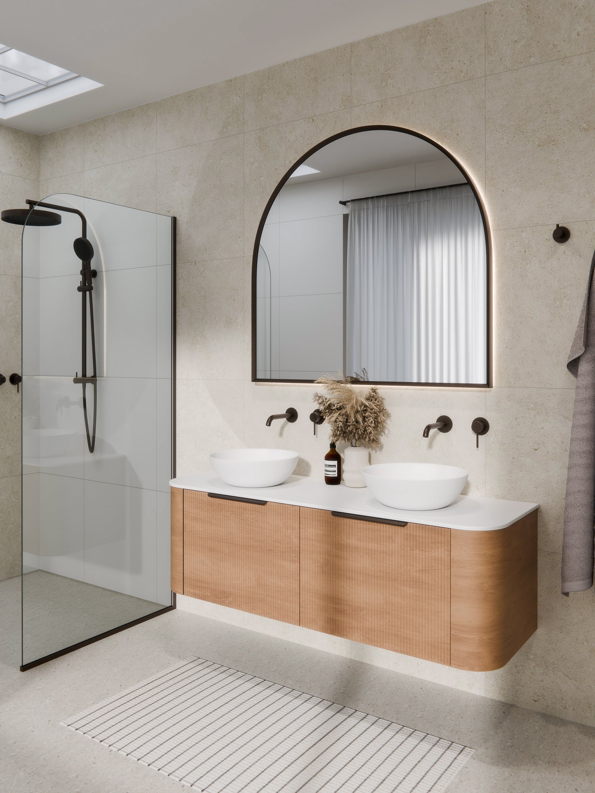 aura-framed-arch-led-mirror-in-brushed-bronze-bathroom-setting-render