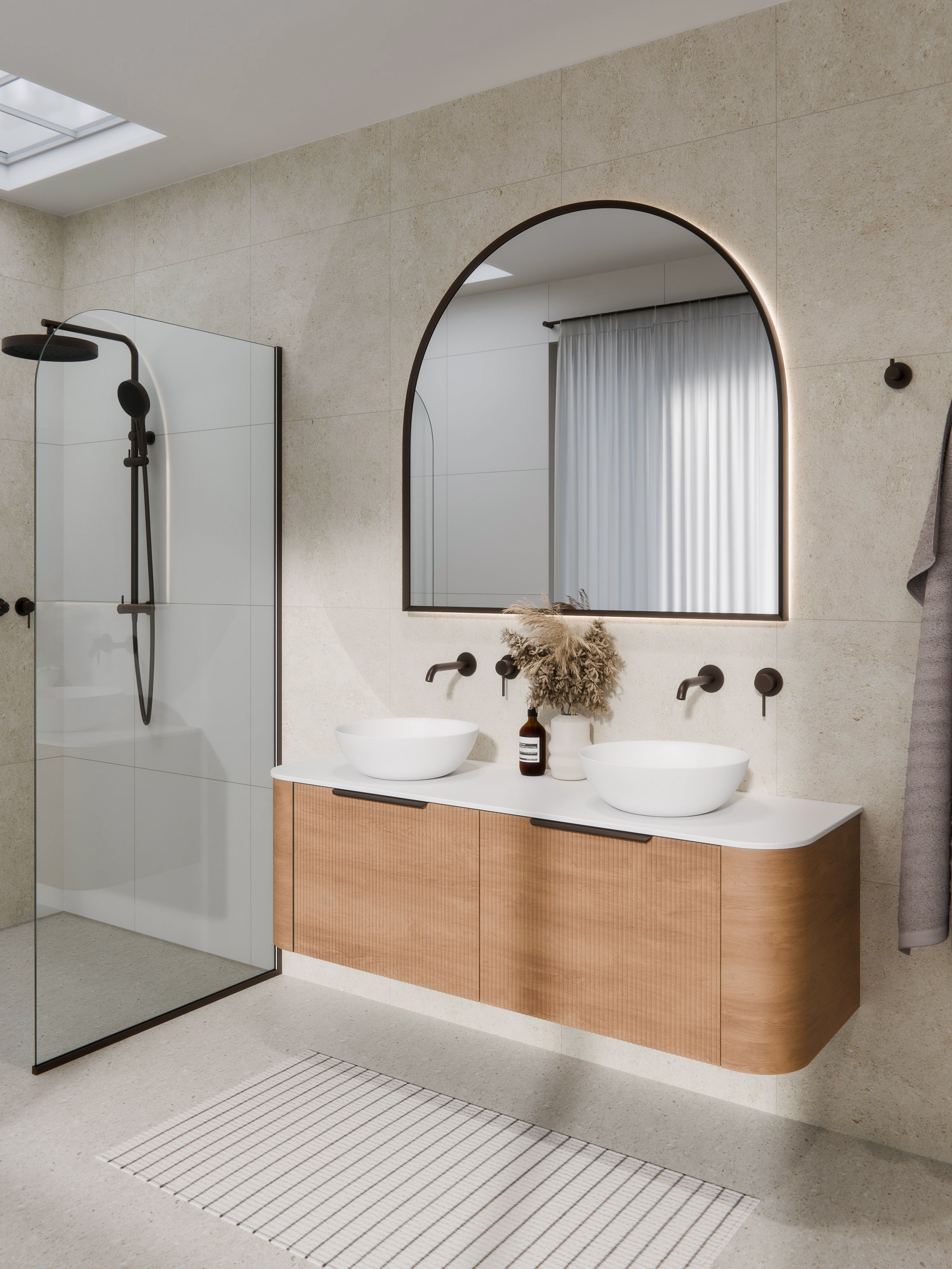 aura-framed-arch-led-mirror-in-brushed-bronze-bathroom-setting-render