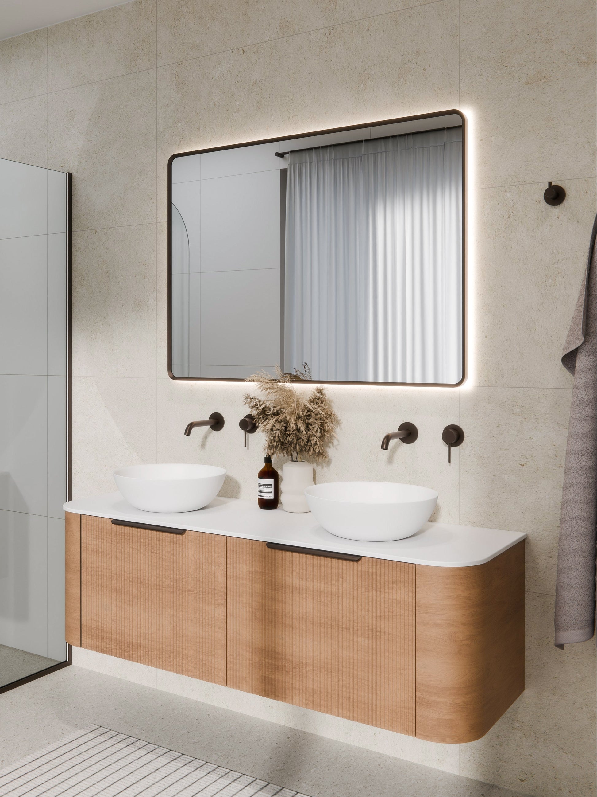aura-framed-rectangle-led-mirror-in-brushed-bronze-bathroom-setting