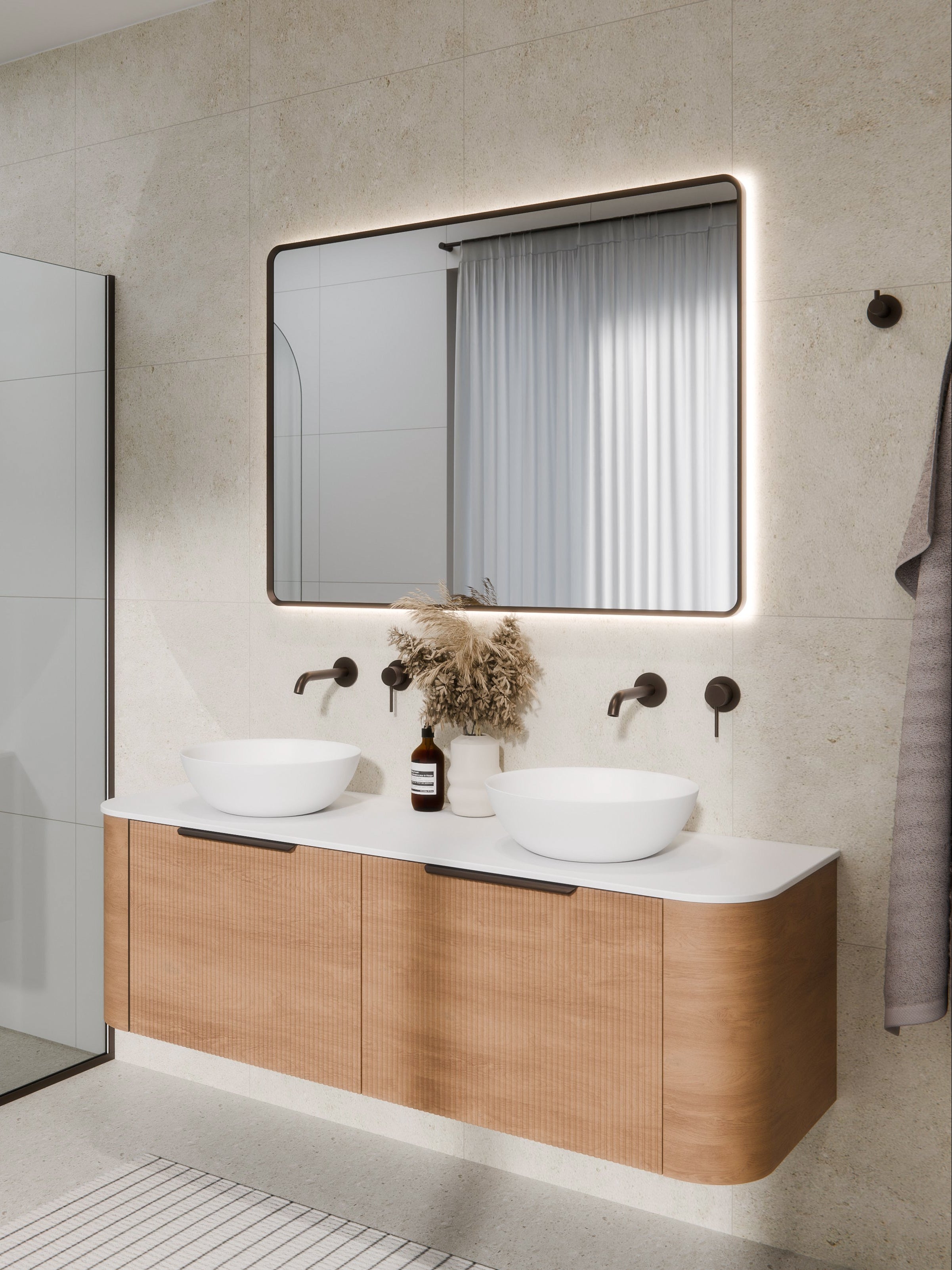 aura-framed-rectangle-led-mirror-in-brushed-bronze-bathroom-setting