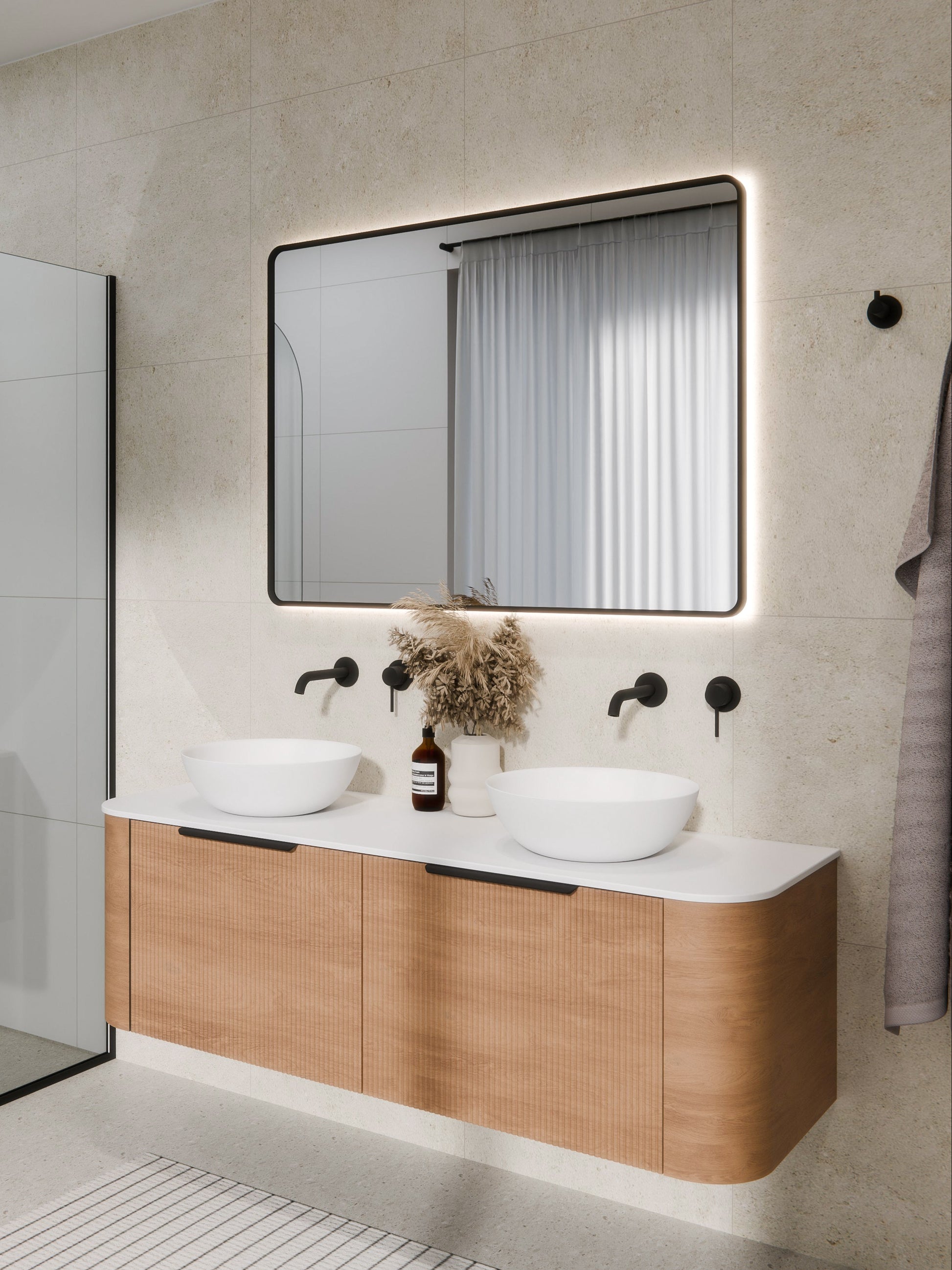 aura-framed-rectangle-led-mirror-in-matte-black-brass-bathroom-setting