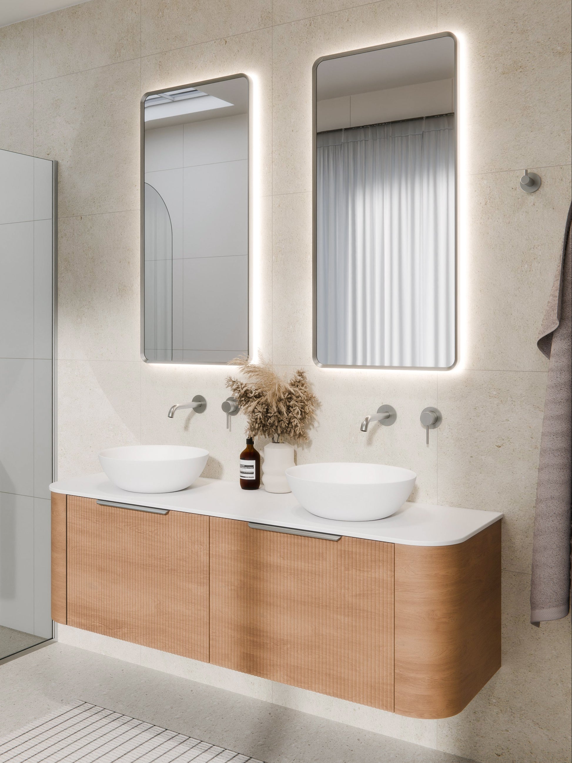 aura-framed-led-mirror-in-brushed-nickel-bathroom-setting