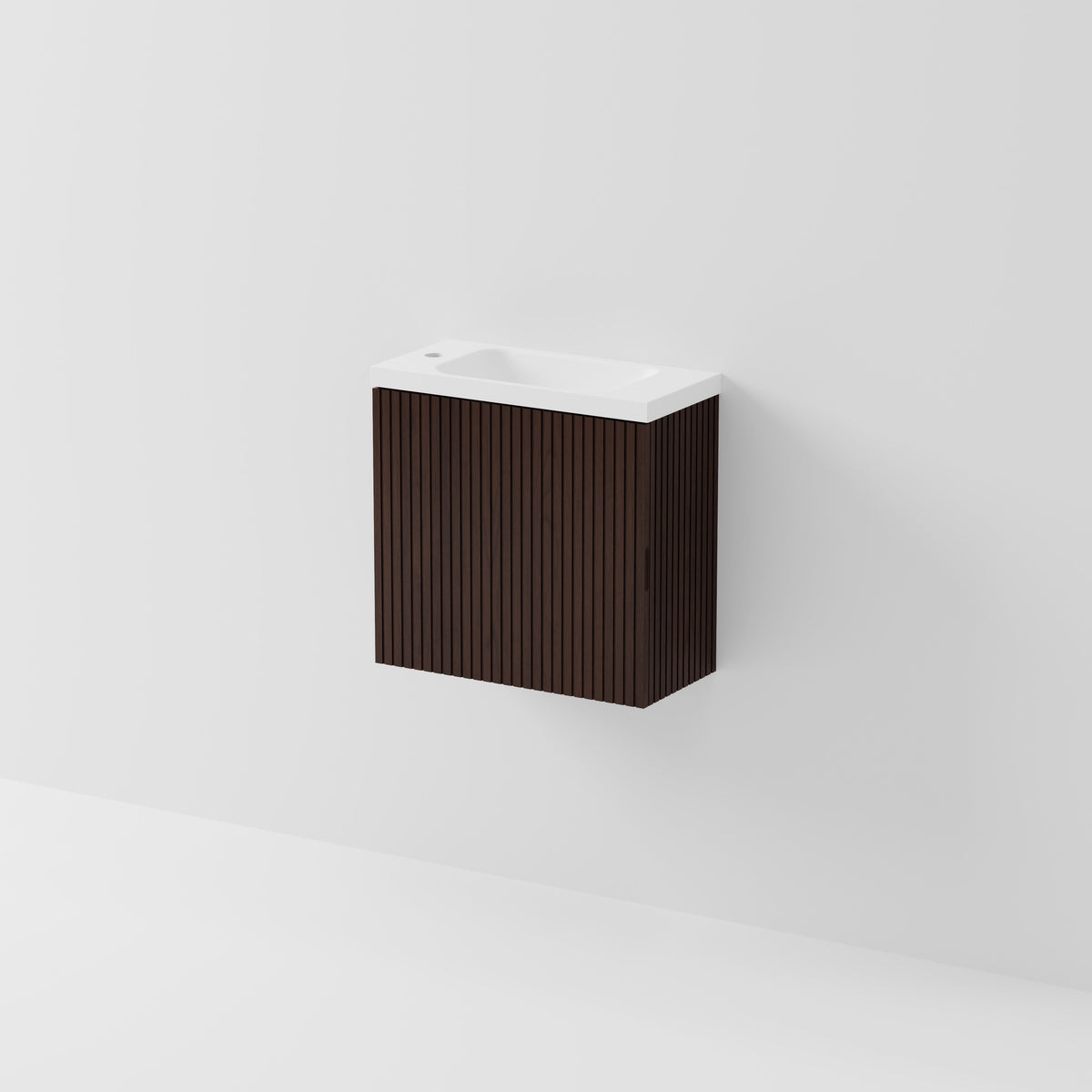 A modern wall-mounted bathroom vanity with a dark brown vertically slatted cabinet and a white ceramic basin, shown against a clean white wall.