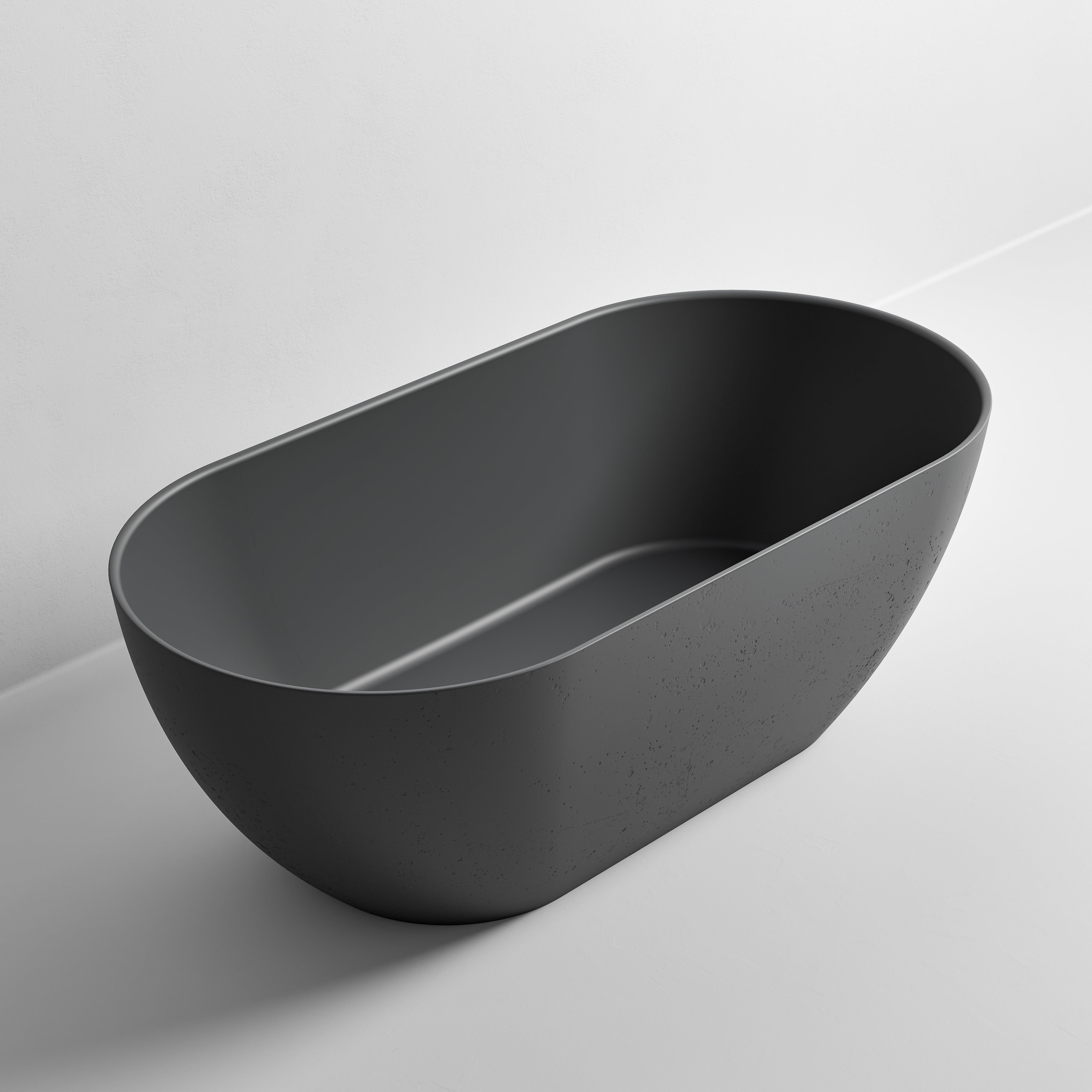 freestanding-bath-in-dark-grey-made-from-textured-solid-surface