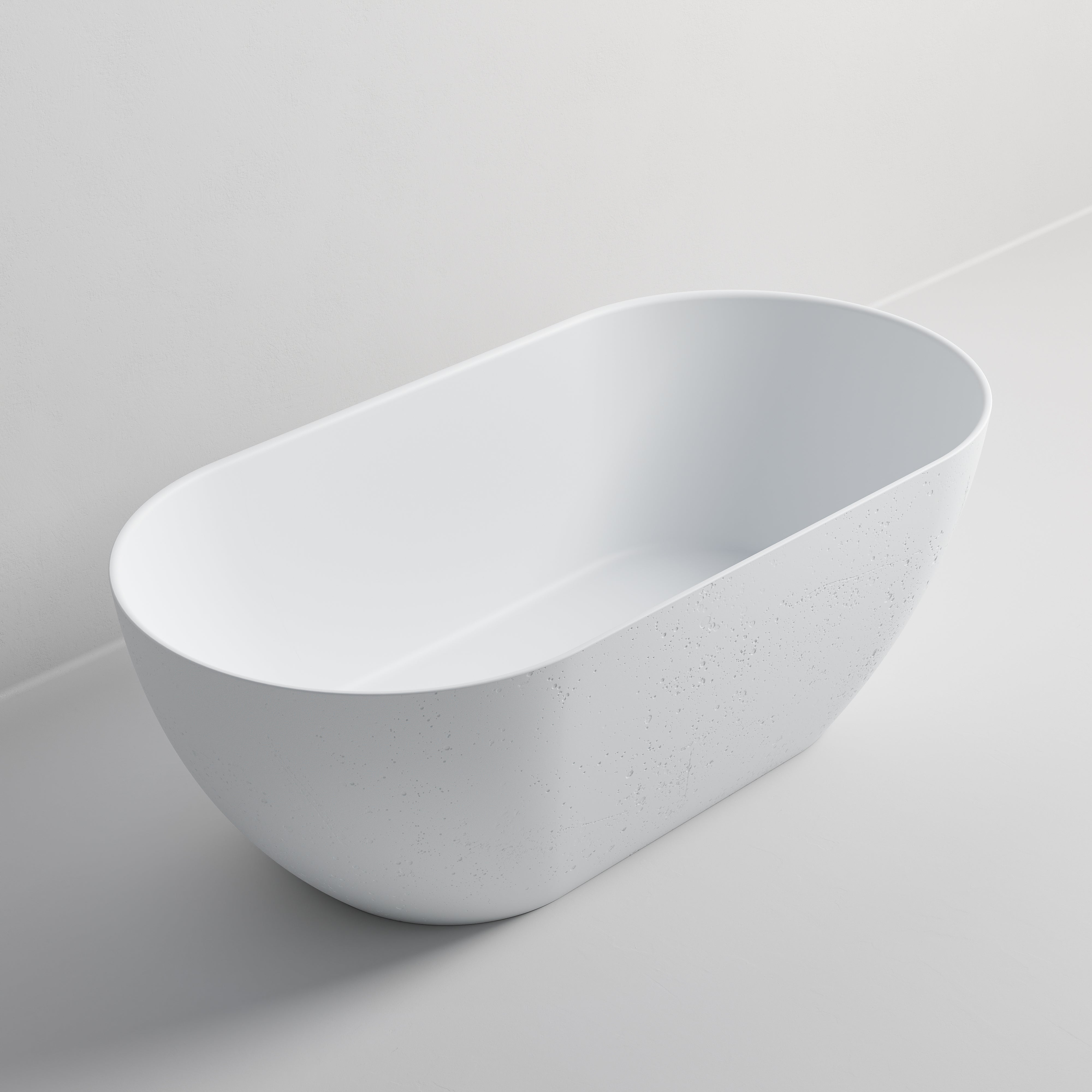 halo-earth-freestanding-bath-in-matte-white-made-from-textured-solid-surface