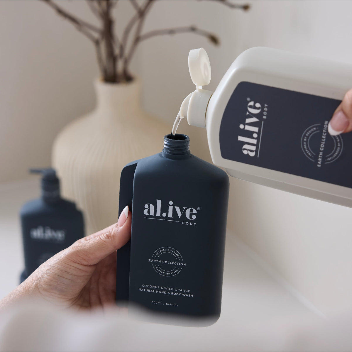 al.ive body Hand & Body Wash Refill Coconut & Wild Orange - lifestyle shot