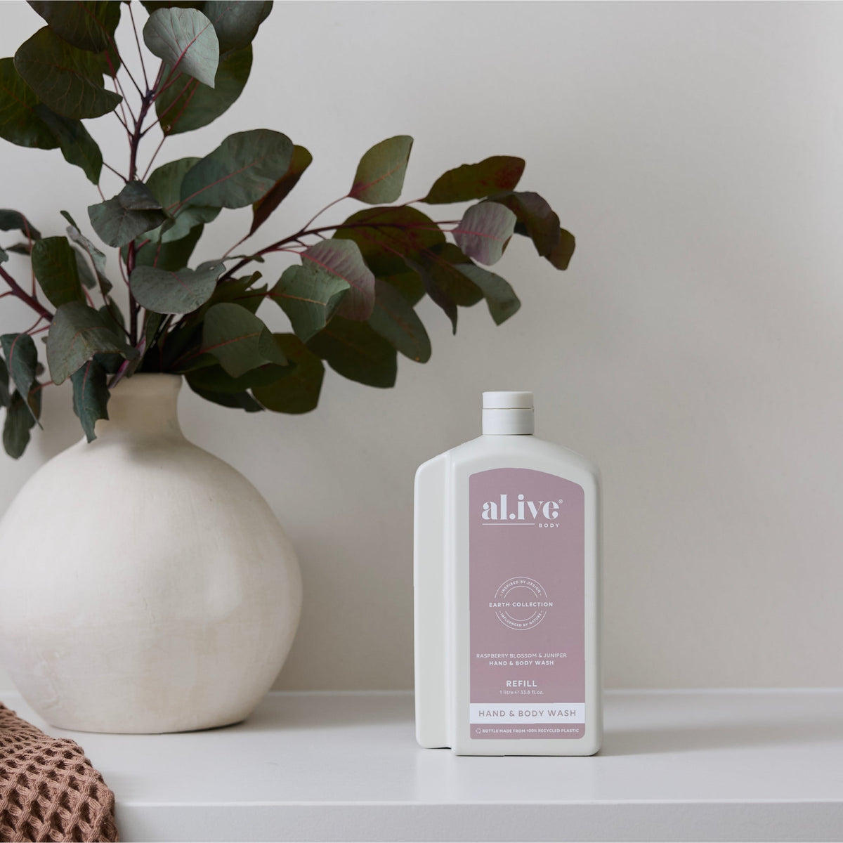 al.ive body Hand & Body Wash Refill Raspberry Blossom & Juniper - lifestyle shot