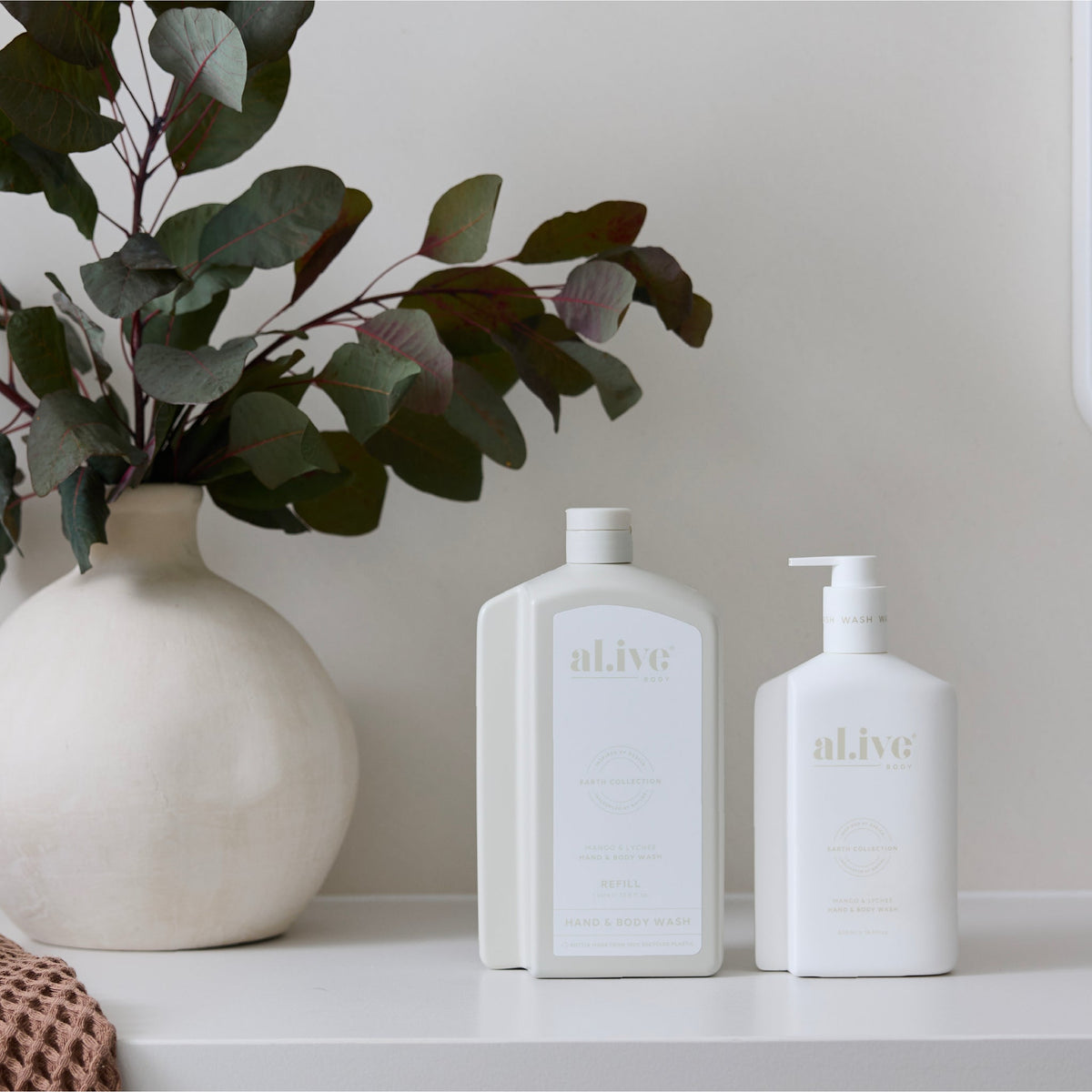 al.ive body Hand & Body Wash Refill Mango & Lychee - lifestyle shot