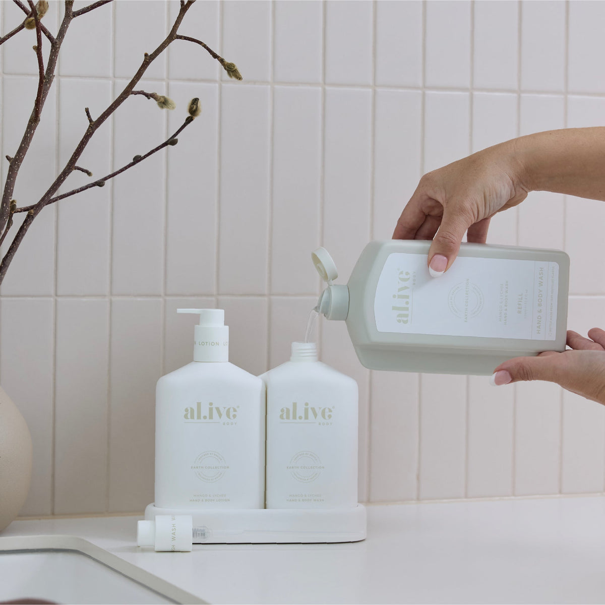 al.ive body Hand & Body Wash Refill Mango & Lychee - lifestyle shot