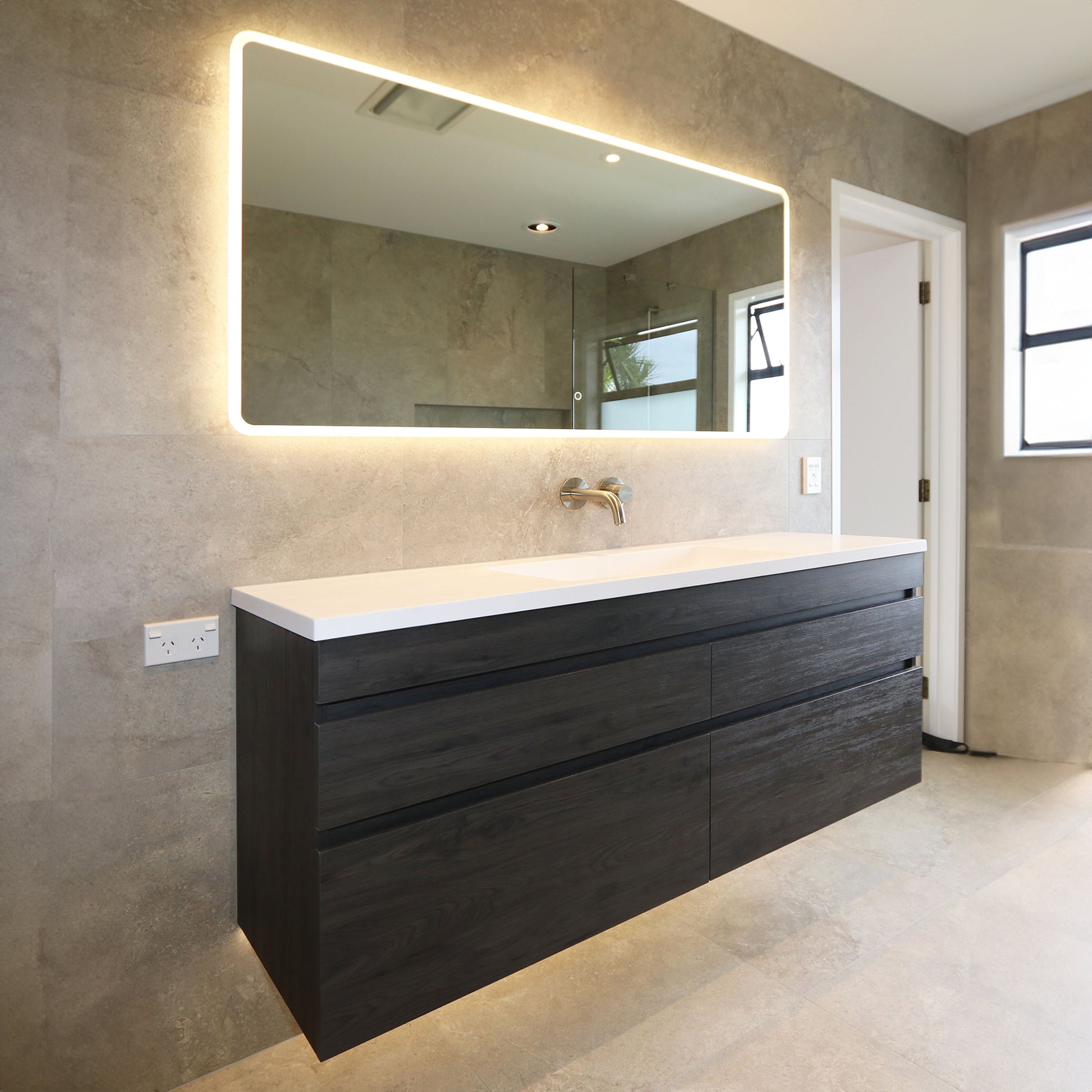 matte-black-vanity-with-solid-surface-top