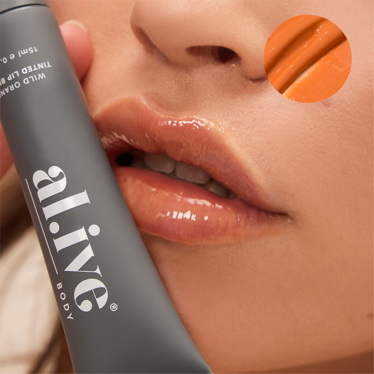 al.ive body Tinted Lip Butter Wild Orange - product shot