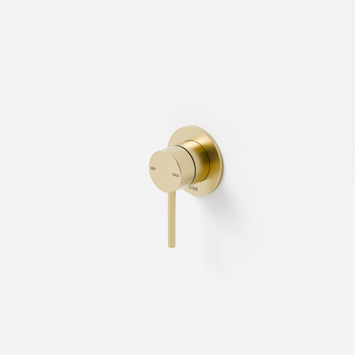nature-shower-mixer-in-brushed-brass-with-the-code-logo-on-the-faceplate