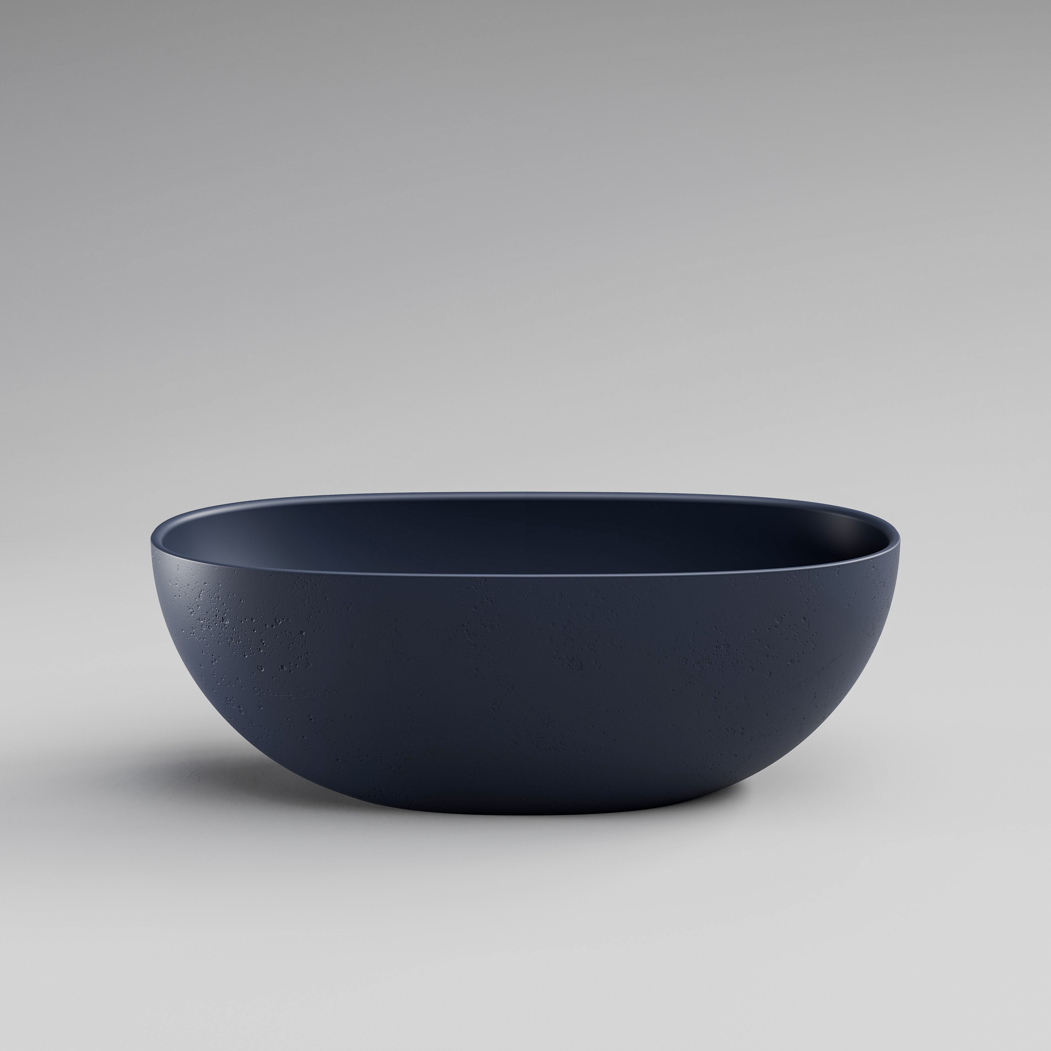 Code-Cove-Concrete-Freestanding-Bath-Tub-In-Blue-Side-view