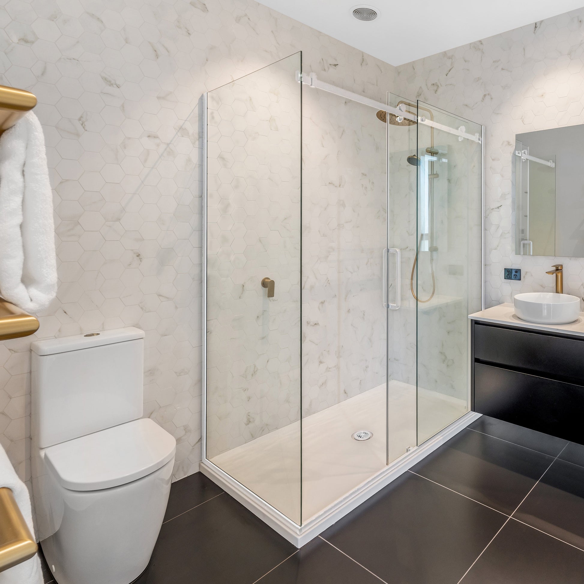 luxury-tiled-shower-with-glass-sliding-door-in-bathroom-setting-white-right-hand