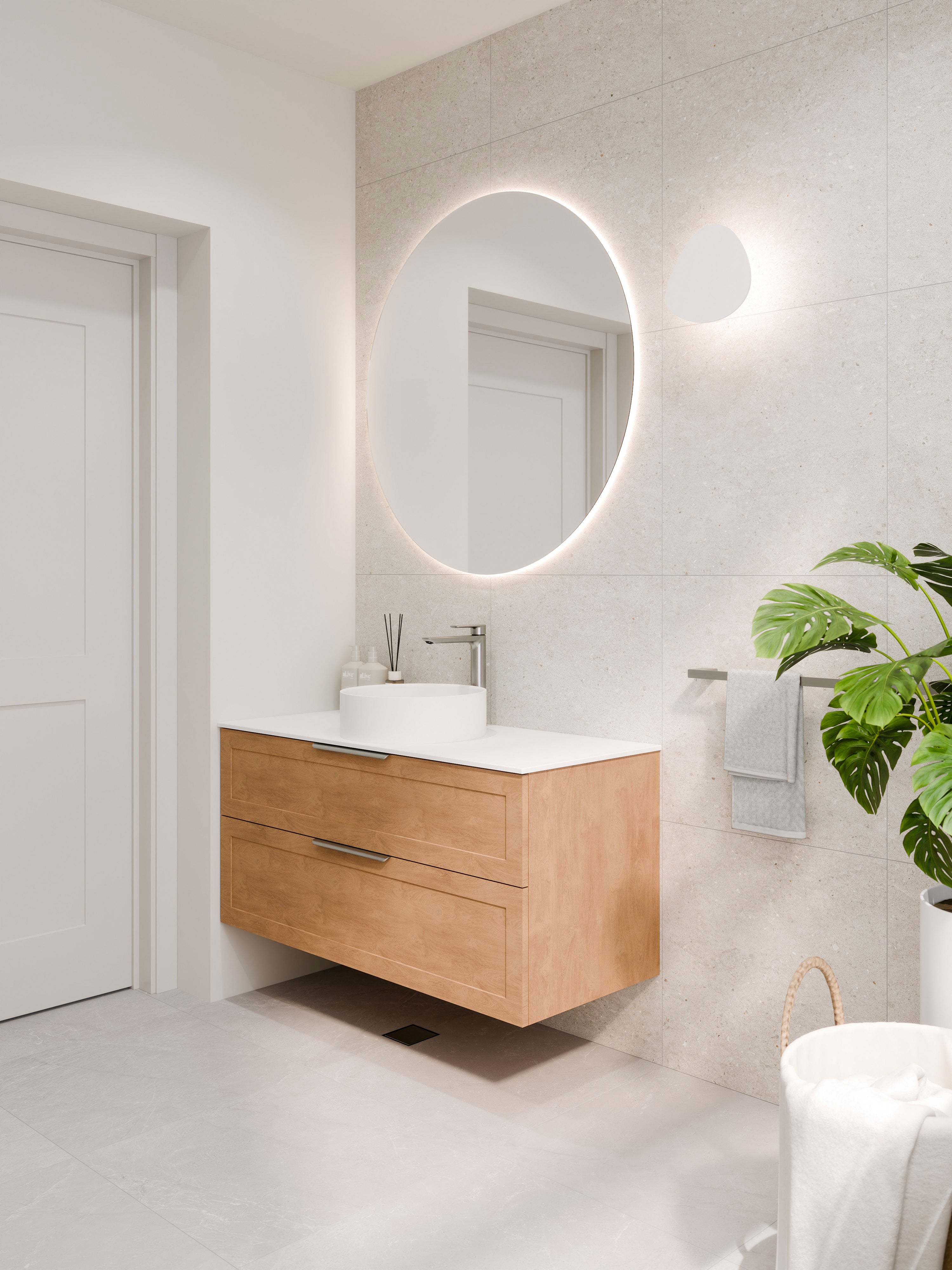 tall-brushed-nickel-basin-mixer-in-the-bathroom