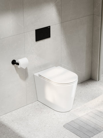 pure-typhoon-in-wall-cistern-toilet-suite-with-black-flush-panel-in-bathroom-setting