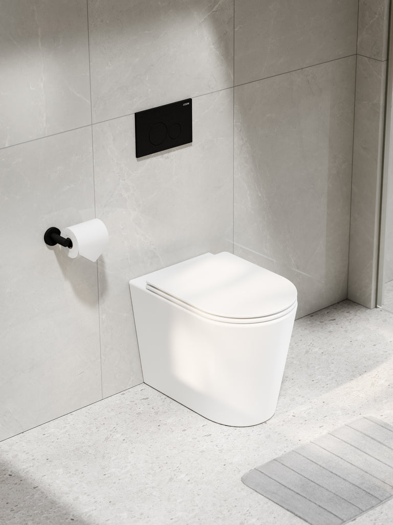 pure-typhoon-in-wall-cistern-toilet-suite-with-matte-white-toilet-black-flush-panel-in-bathroom-setting
