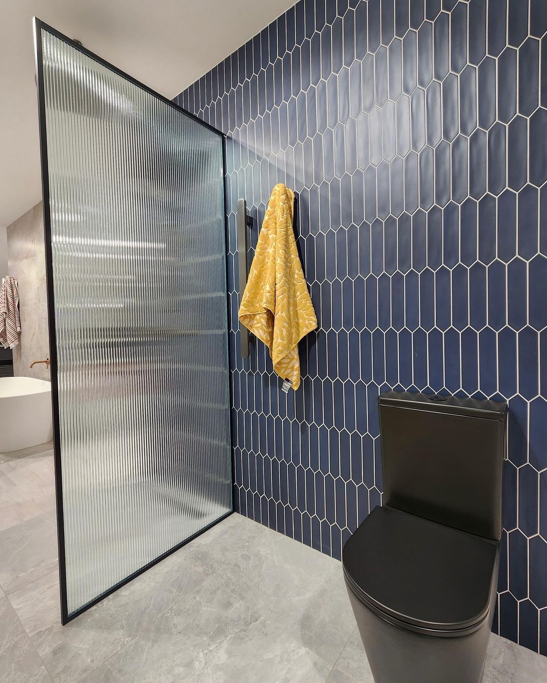 CUSTOM REEDED WALK IN PANEL SHOWER SCREEN WITH BLACK FRAME