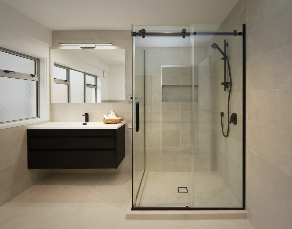 luxury-black-framless-glass-door-tiled-shower-kit-in-tiled-bathroom