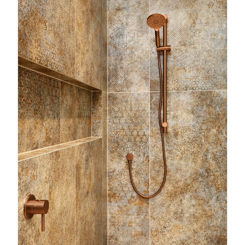 code-dusk-slide-shower-brushed-copper-in-tiled-bathroom-setting